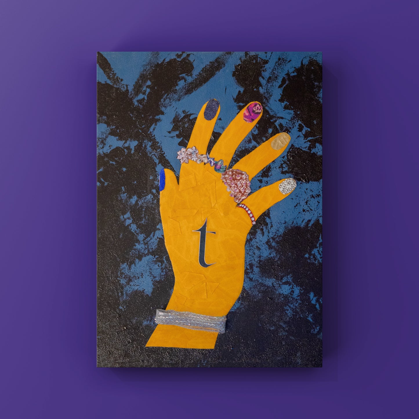 Painting of a yellow hand with jewelry on a textured blue and black background