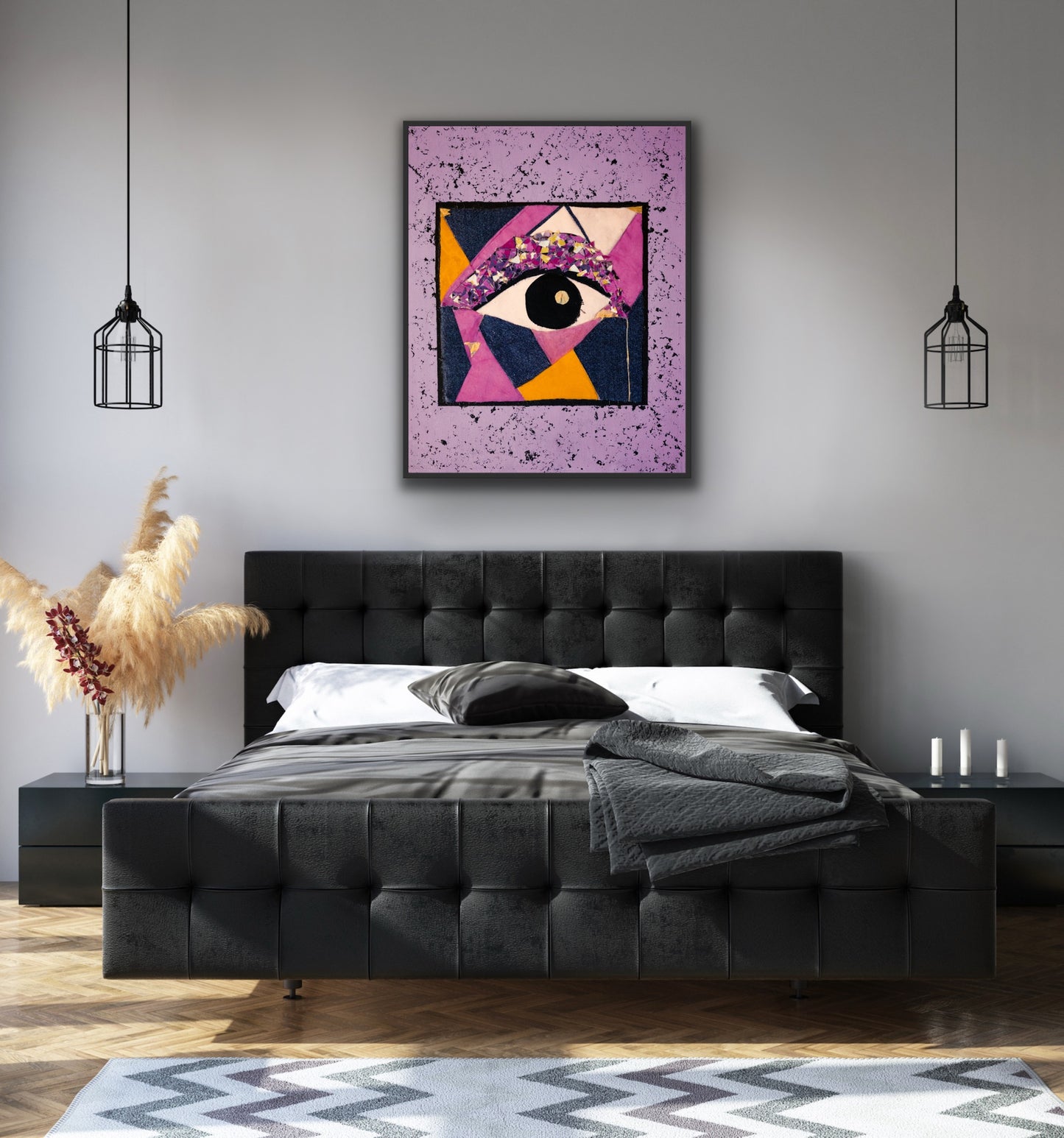 Modern bedroom with a black upholstered bed, abstract art on the wall, and decorative elements.